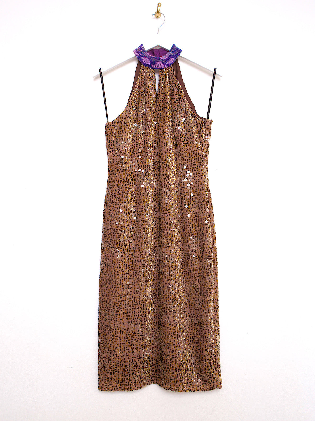 Sleeveless leopard print party dress with purple satin alter neck and vintage clothing style.