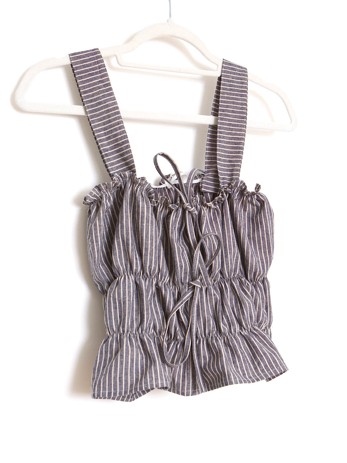 Blue and white stripes crop top with shoulder straps and bows