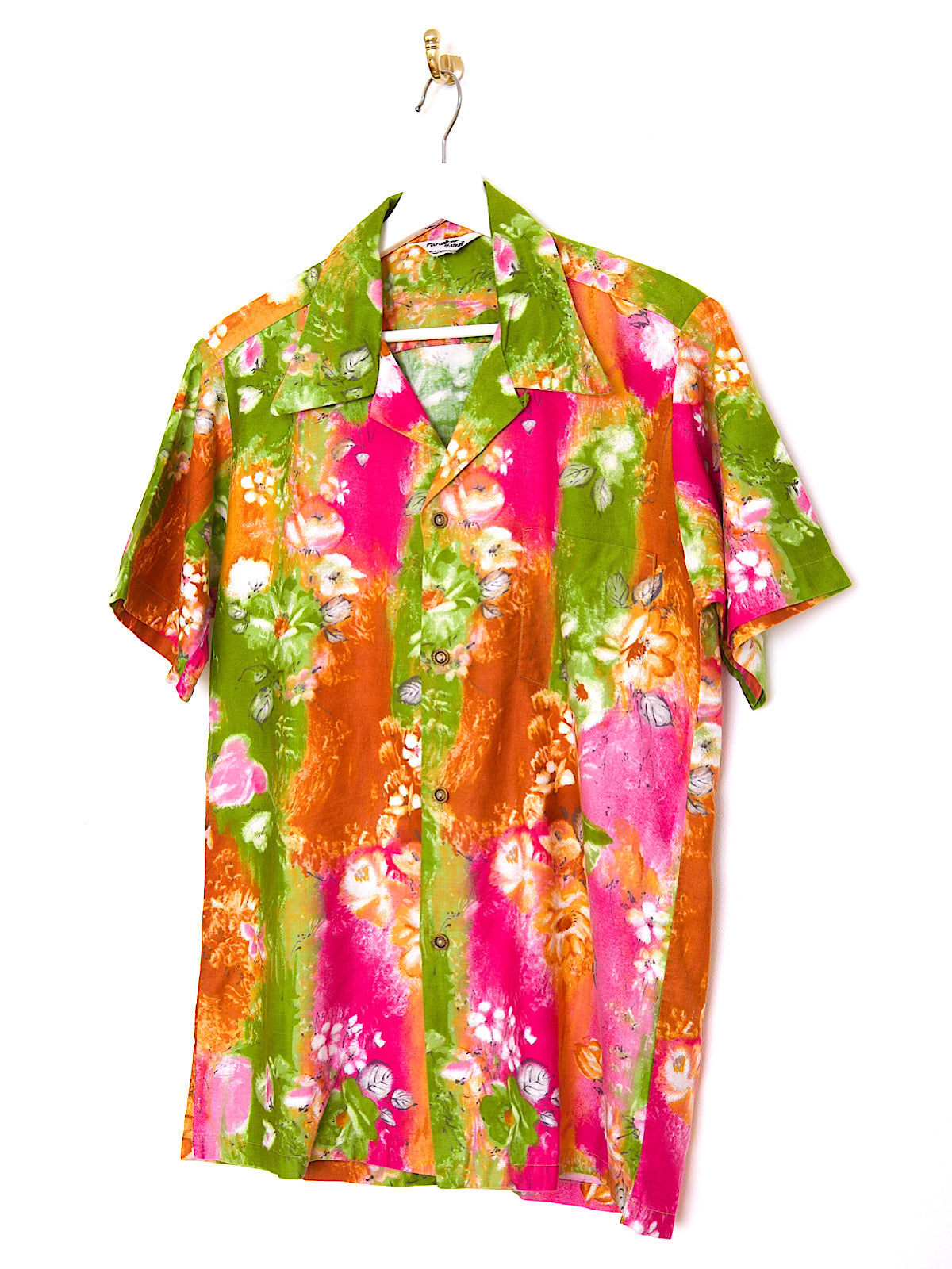 60s vintage clothing bright multicolored floral cotton Hawaii shirt with short sleeves.