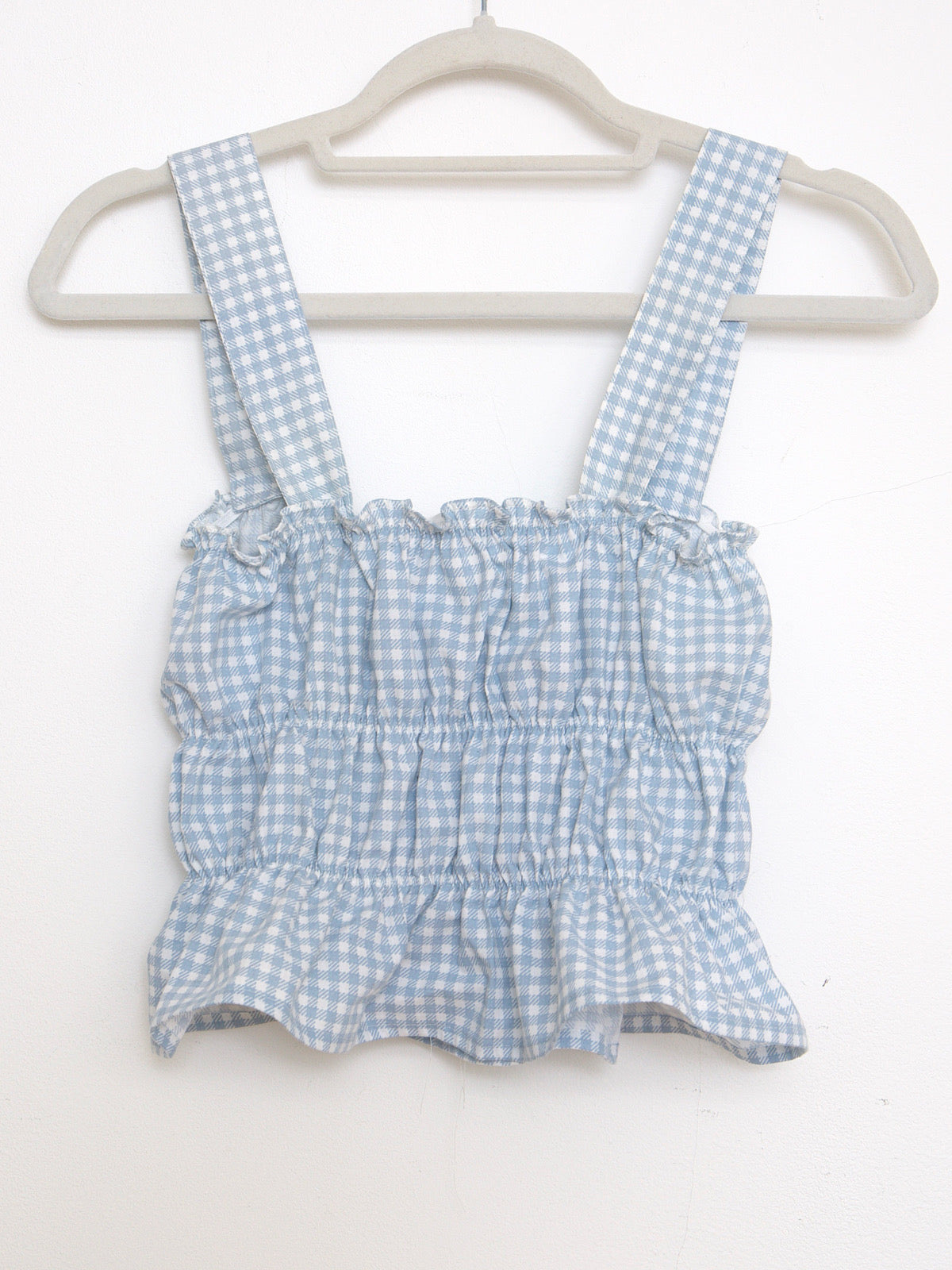 Blue gingham crop top with shoulder traps and front bows